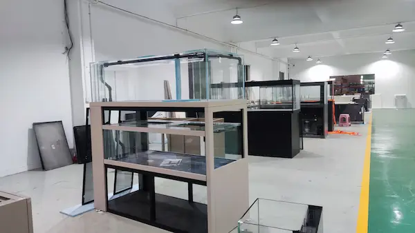 Export crating area with foam-protected aquariums ready for shipping